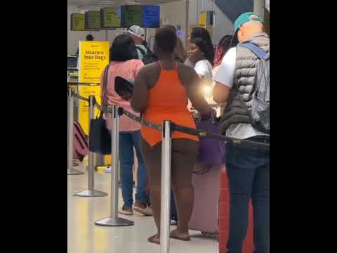 A Spirit Airlines passenger looks to be bottomless at check-in