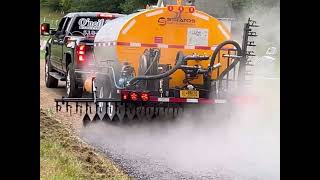 Stratos Asphalt Distributor spraying CRS2P and chip sealing a cemetery