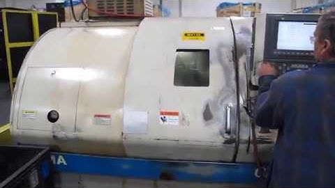 Okuma Crown 762E CNC Turning Center with 8" 3-jaw SMW Chuck