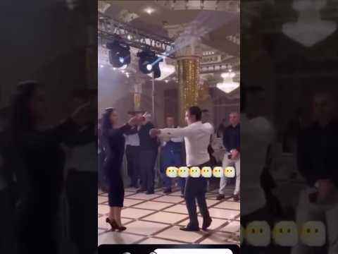 красивая пара танцует лезгинку. амур любви пронзили сердце девушки.