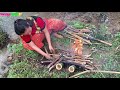 Survival skills - skills cooking eggs in a bamboo tube and meet forest people eating delicious