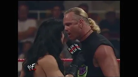 Jeff Jarrett hits Chyna with his guitar and Billy ...