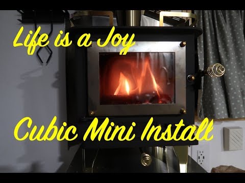 bus-conversion-to-motor-home-#171-wood-stove-installation,-cubic-mini-(grizzly)