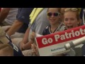 Patriots fans support Tom Brady during training camp opening.
