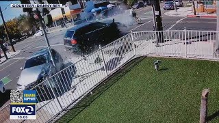 Cars collide, nearly hitting bike rider in dramatic video