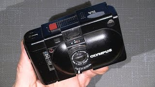 Working with Olympus XA clean the viewfinder and other details