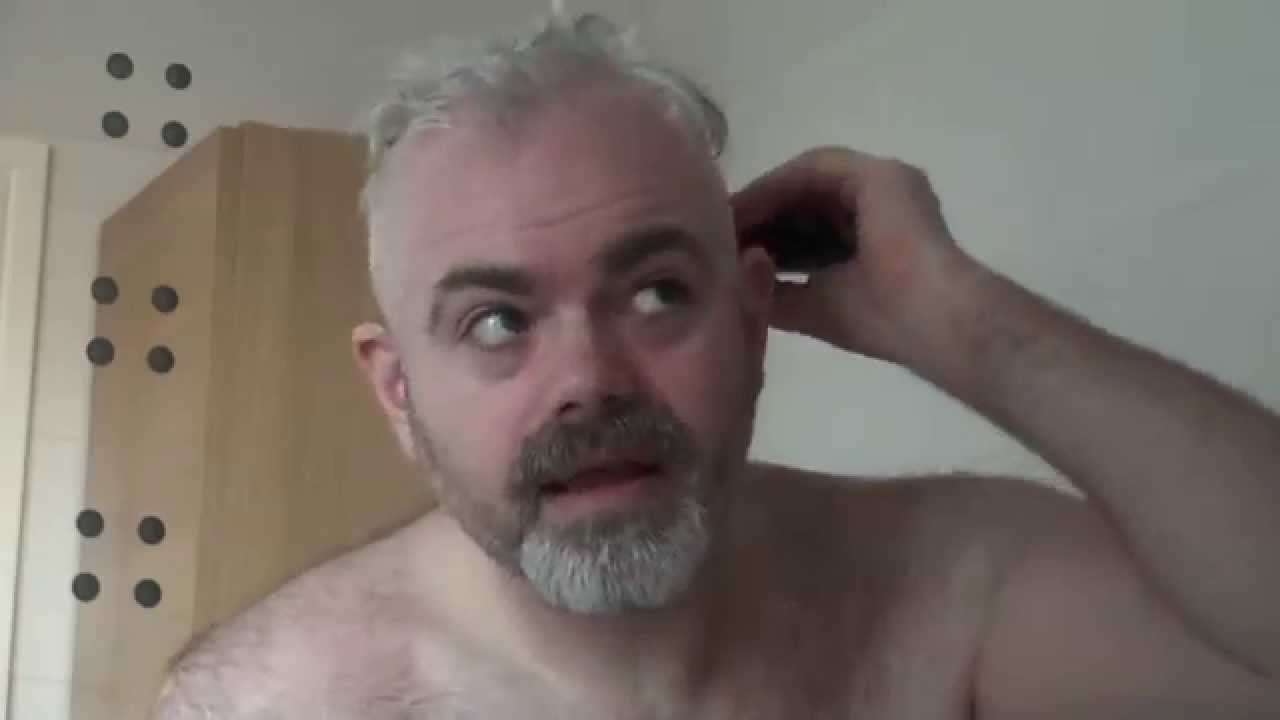 using beard trimmer to shave head