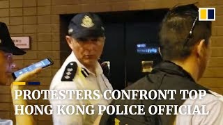 Subscribe to our channel for free here: https://sc.mp/subscribe-
hundreds of anti-government protesters tried confront a chief
superintende...