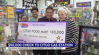 $50,000 check presented to gas station