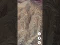 صخور ملونة لها ملامح بشرية موجودة على غوغل إيرث زوروا قناتي لرؤية ٱيات الله