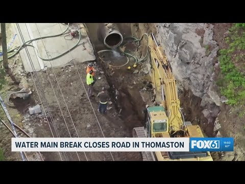 Water main break closes road in Thomaston - YouTube