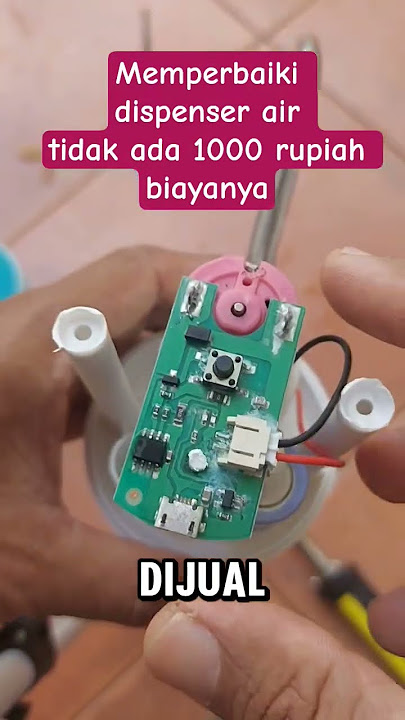 Perbaikan dispenser galon air minum.