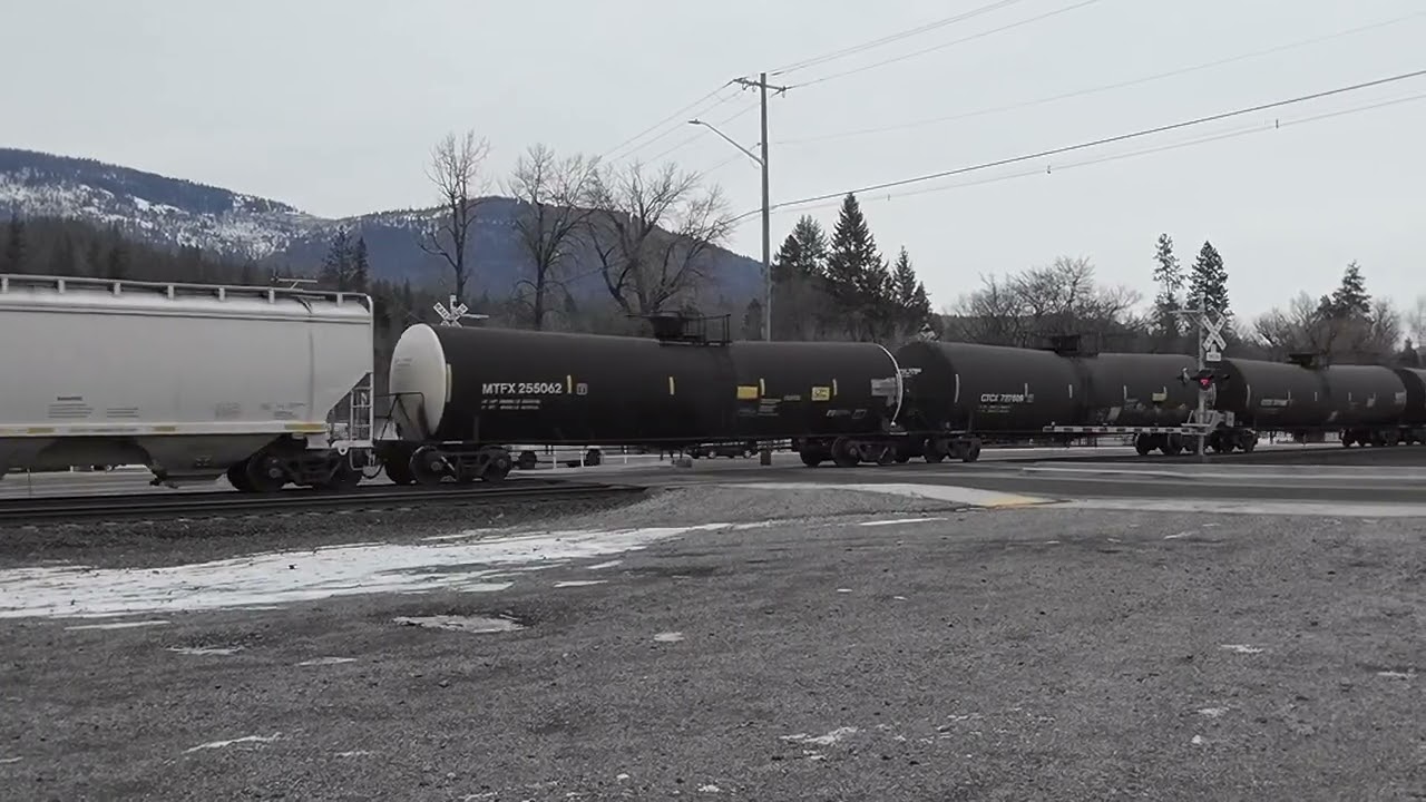 Westbound manifest train moves through Rathdrum Idaho