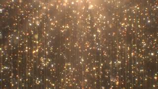 Beautiful Gold Glitter Particle Rain Falling Shimmers Sparkle Light 4K DJ Visuals Loop Backgroud
