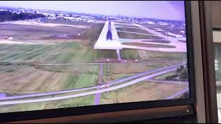 Belly camera on airplane landing at YUL flying over lac St-Louis and highway 20