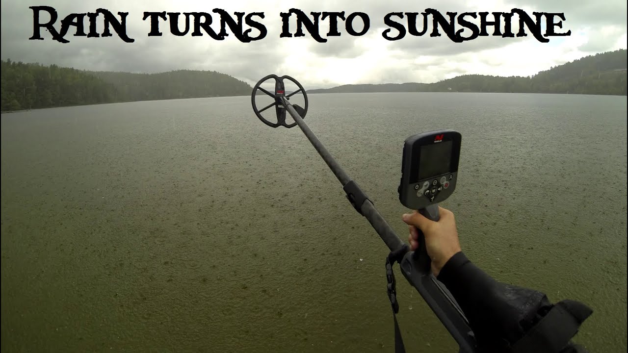 Shallow water metal detecting - Rainy day turns into sunshine and silver
