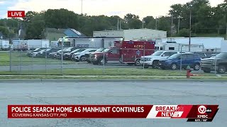 Police at home in connection with KC manhunt