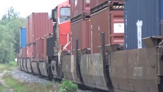 Big Wave from the Hogger! Long Stack Train CN 120 w/DPU Rolling thru Moncton, NB in the Smoky Haze