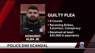 Former Albuquerque police officers plead guilty in federal court