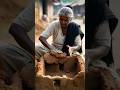 dadi ne mitti se ek chhota ghar bna Rahi hai /amazing wooden sculpture art work dadi #murti #video