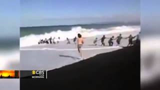 Human chain helps save 12-year-old boy