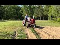 Setting up rolling cultivators on the farmall super a