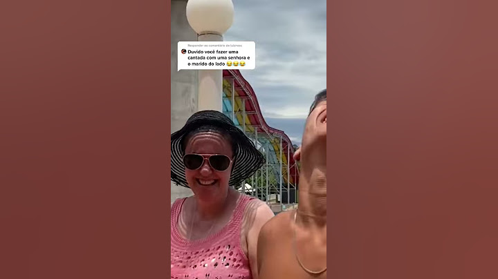 CANTADA EM UMA SENHORA(COM O MARIDO DO LADO)