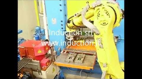 Automatic forging island complete of induction heater, forging press and robot for bars