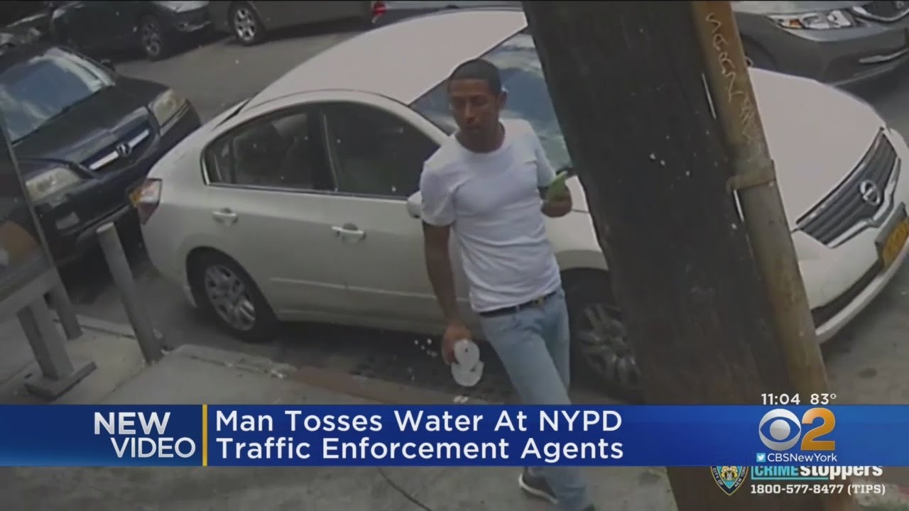 Man Seen Throwing Water At Officers In Queens