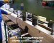 Blockhaus Herstellung Hundegger VS MAKRON Finnscania log home manufacture Blockhausfabrik
