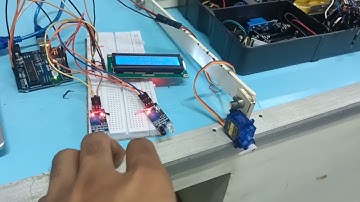 Sistem parkir otomatis menggunakan sensor IR dan Rangkaian Sensor Load cell