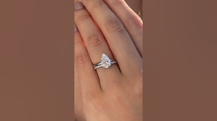 4 Ways to Wedding Band —Pear Shape Engagement Ring Edition