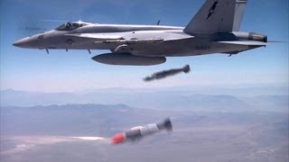 F-16, F-15 Weapon Assembly, Takeoff, and Bombs Drop.