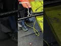 Cable Worker Process Installing Protective Spiral Cable Wrap