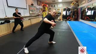 Teaching praying mantis Kungfu + my two students sparring