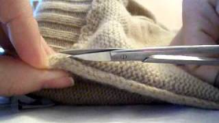 unraveling a sweater seam