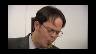 Dwight eats his survival shelter food. The office.