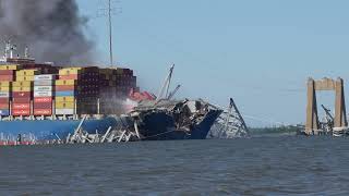 Demolition teams blow up the Key Bridge in Baltimore