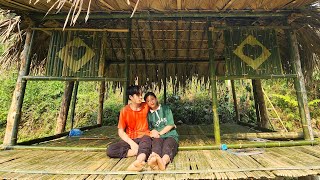 Young Couple Building Bamboo House In The Forest. Build Shelter & Survival