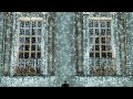City building facade illuminated with Christmas and New Year lights for holiday celebration