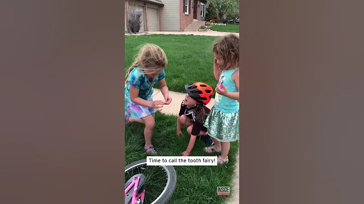Little Girl's Little Sister Helps Her Knock Out Loose Tooth #shorts