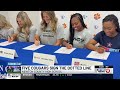 Five Newton County Cougars sign the Dotted Line
