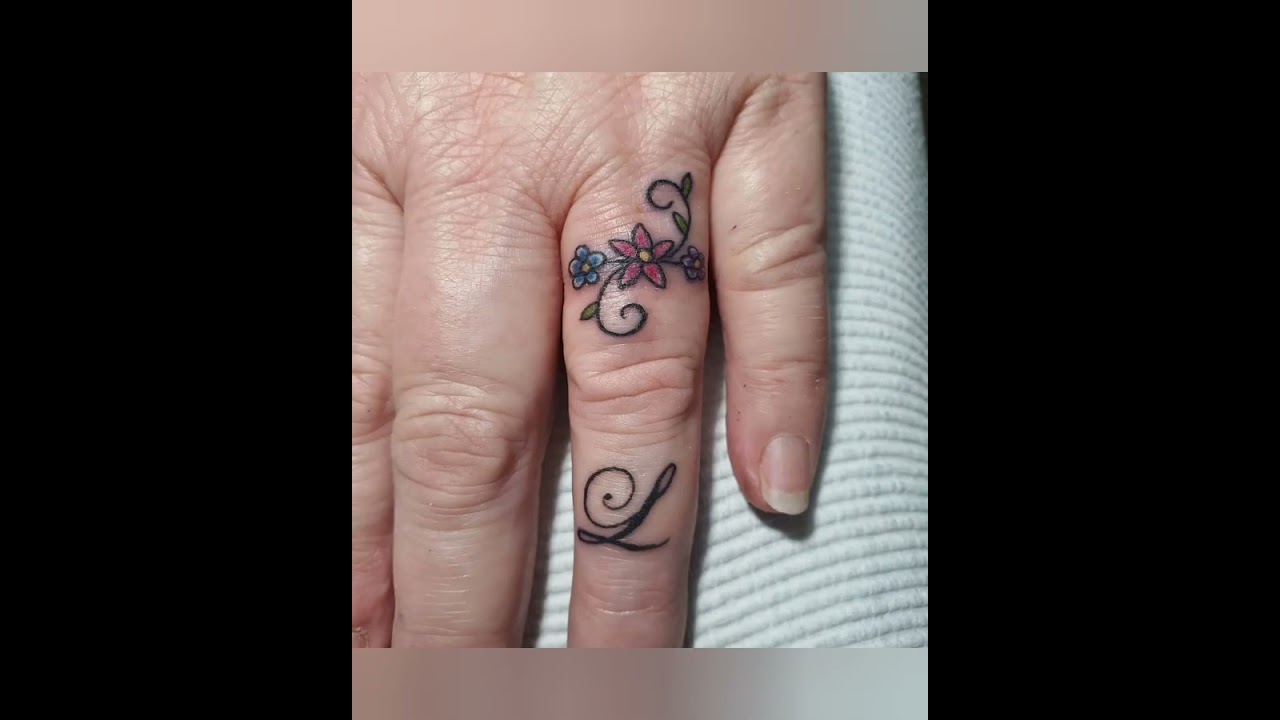 Music Note Finger Tattoo