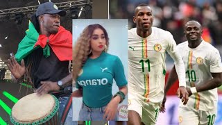 Paco Bête Bête and his wife Chacha Niogi Yeugeul Cices after Senegal's resounding victory