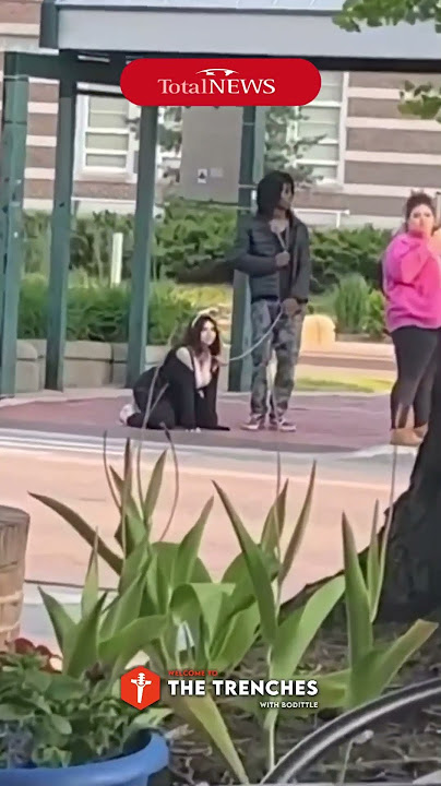 Walking a woman on a leash???