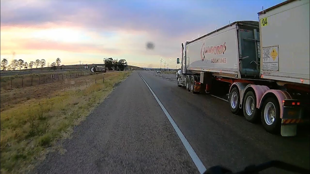 256-QXU Crawfords Freightlines Runs Smaller Truck Off The Road