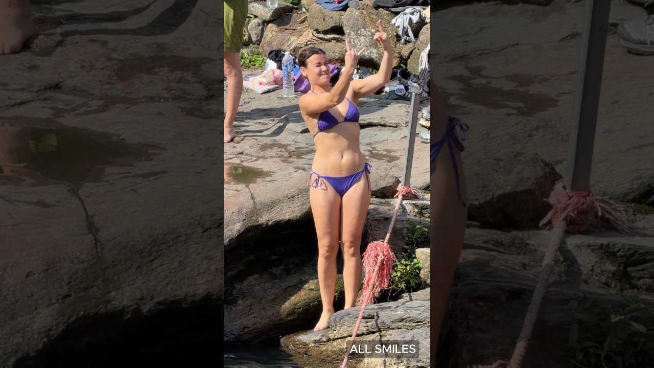 Beautiful Angel Girls Enjoying Nature at the Waterfall 
