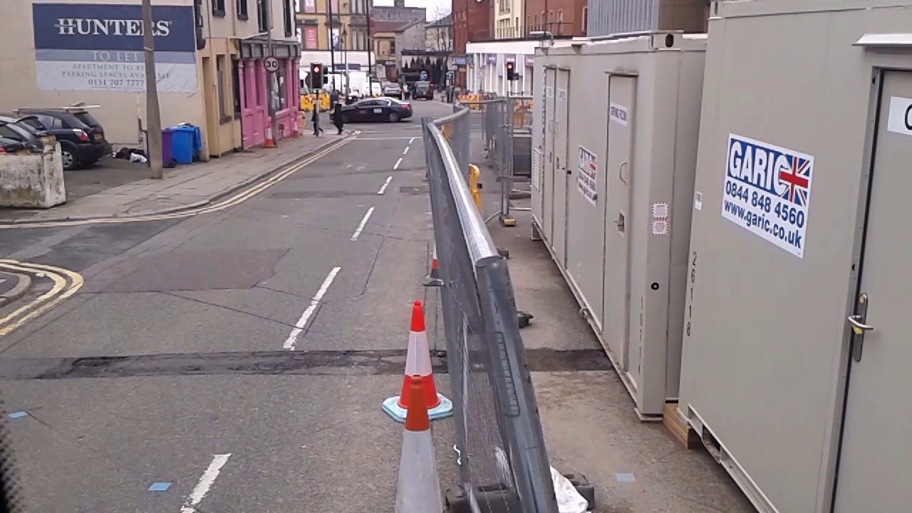 Idiot driving wrong way up a one way street. - YouTube