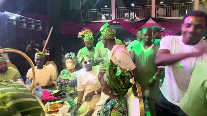 THE GRAND ENTRANCE OF QIBLA AT THE PREMIERE OF INDIGINE, A MOVIE BY YUSUF AKINTUNDE, (AMUDA EKO).