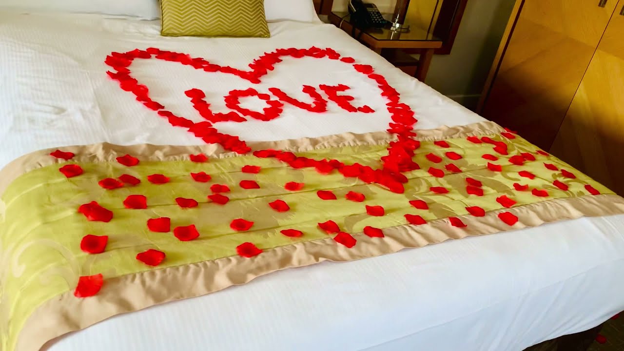 Easy Romantic Anniversary Ideas. Explosion of Red Rose Petals in a
